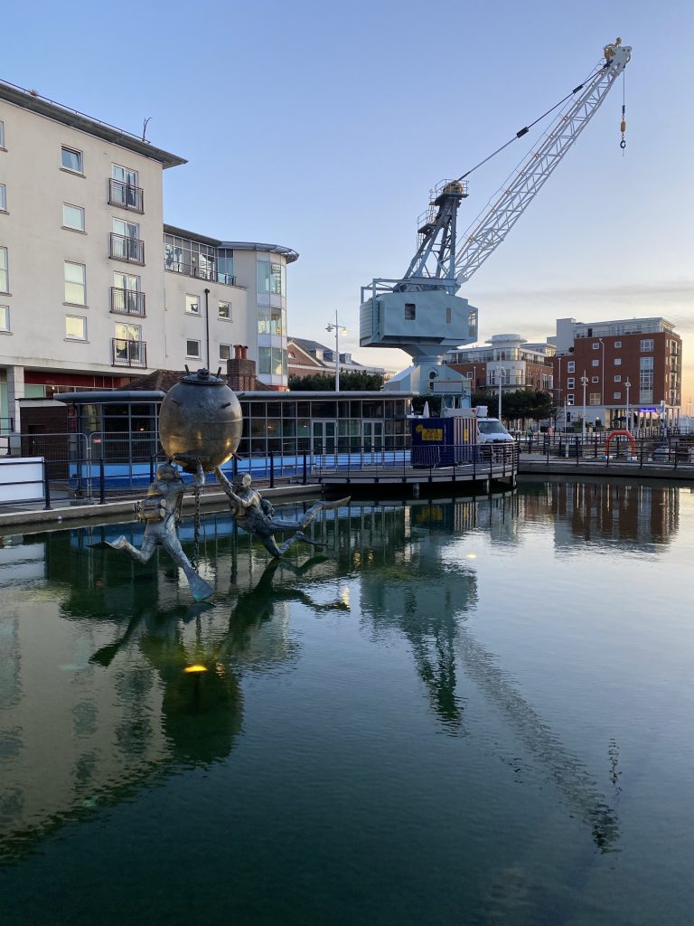 Crane and sculpture at Gunwharf Quays